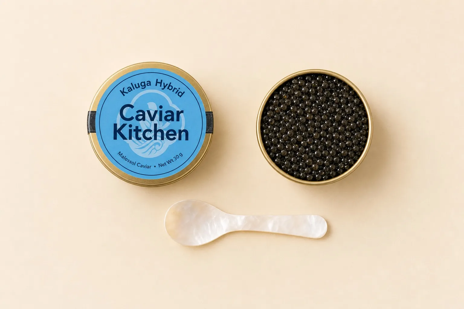 An open tin of Kaluga Hybrid caviar beside the Caviar Kitchen Kaluga Hybrid tin and a mother-of-pearl spoon